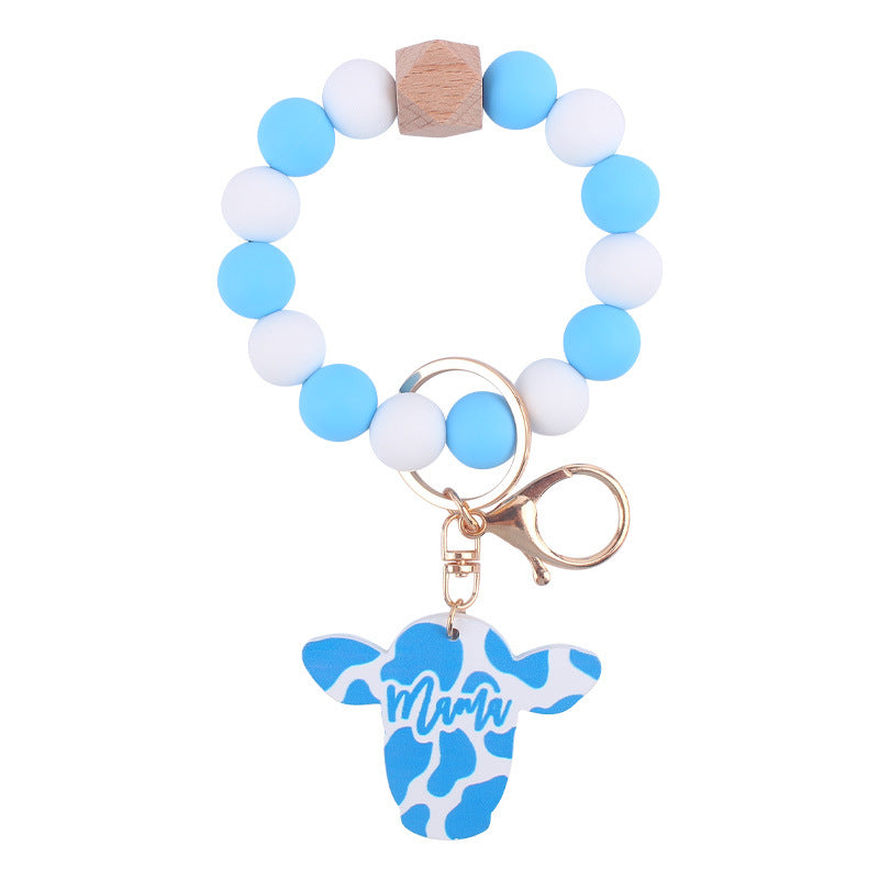 Wholesale Silicone Beads Cartoon Western Style Bull Head Wooden Sign Pendant Bracelet Keychains